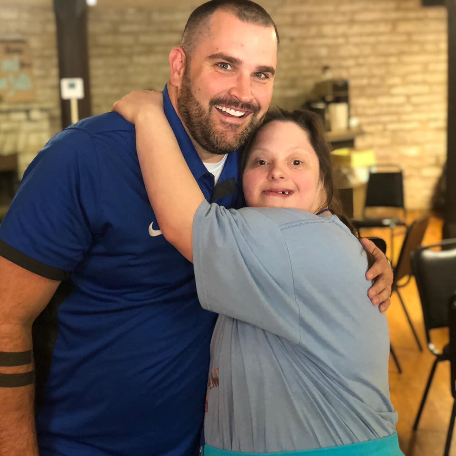 Dave smiling with his friend Audrey.